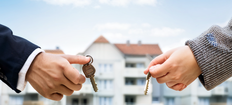a-young-couple-or-family-standing-in-front-of-a-new-house-or-apartment-holding-keys-in-their-hands a-young-couple-or-family-standing-in-front-of-a-new-house-or-apartment-holding-keys-in-their-hands